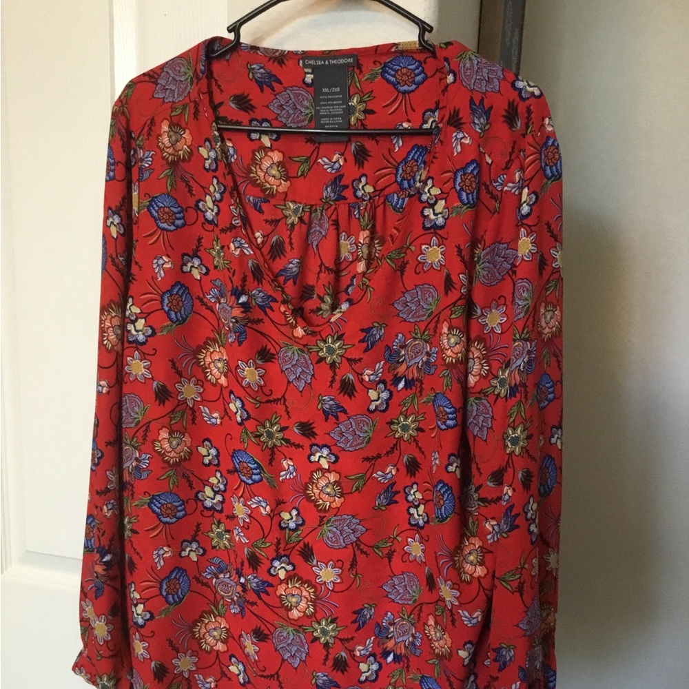 Chelsea and Theodore blouse with back end coverage